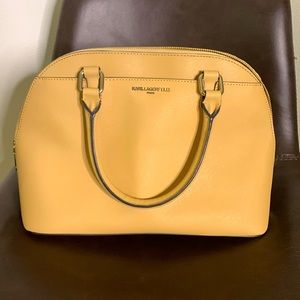 Karl Lagerfeld beige dome cross body.